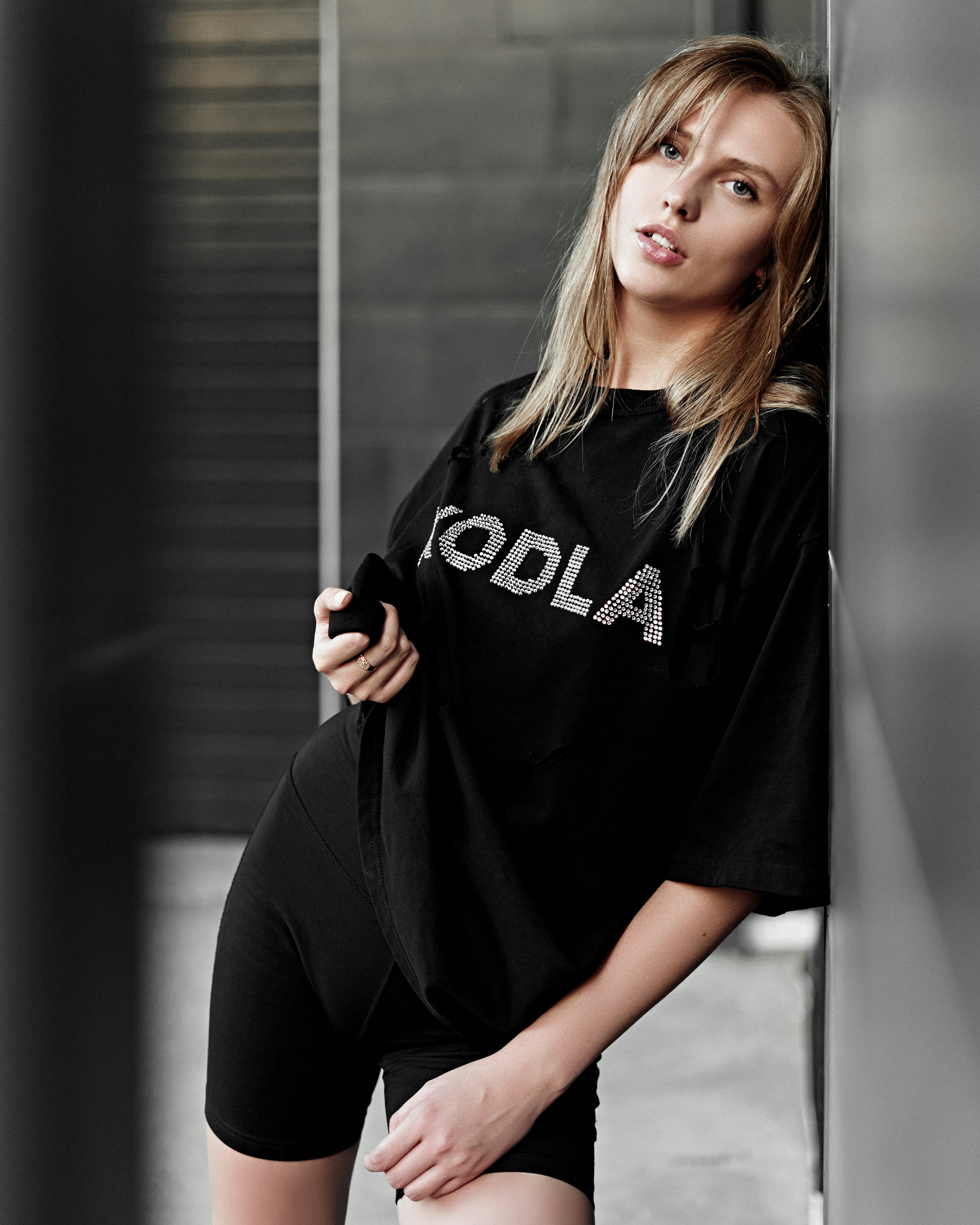 woman in black adidas t-shirt